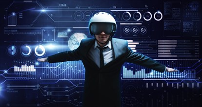 Portrait of a man in a suit and helmet. He shows that he is flying against the background of a hologram of market trading. Business concept. Stock market. Brokers and traders.