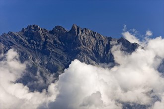 Mountain massif with clouds