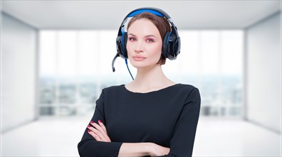 Image of an attractive woman with a headset. TV shopping concept.