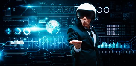 Portrait of a man in a suit and helmet. He put his palm against the backdrop of a hologram of market trading. Business concept. Stock market. Brokers and traders.