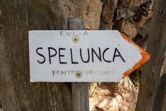 Old hiking sign for the Spelunca Gorge