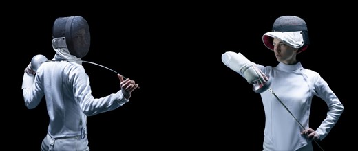 Portrait of two fencers on a black background. The concept of fencing. Duel.