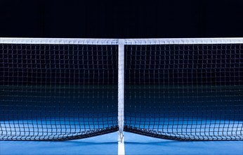 Image of a tennis court with a stretched net. Sports concept.
