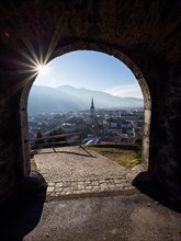View from the Schlossberg through an archway to the town