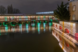 The Vauban dam illuminated at night during Christmas. Strasbourg. Bas-Rhin