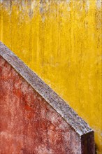 Red and yellow plaster wall
