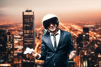 Portrait of a man in a suit and helmet. He launches a paper airplane from the roof of a skyscraper. Business concept.