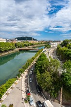 Vertical photo of the Urumea river in the city of San Sebastian in summer