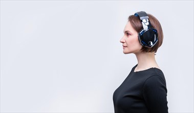 Portrait of an elegant woman with headset. Customer support concept.