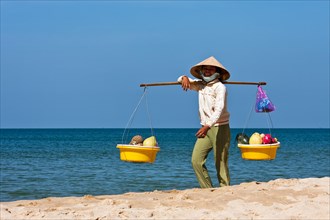 Beach vendor with fruits