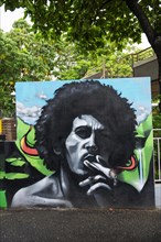 Bob Marley with cannabis cigarette