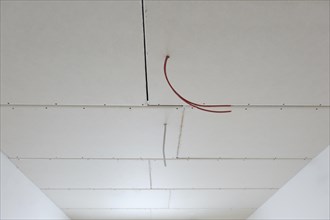 Plasterboard panels under the ceiling