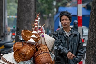 Basket seller in street of Hanoi