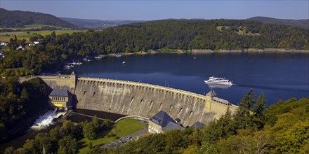 Elevated view of the Eder dam with the dam wall and an excursion boat on the Edersee