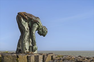 Monument to the stone setter on the Afsluitdijk between the Wadden Sea and the Ijsselmeer