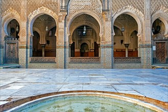 Main marble-paved courtyard of the Madrasa Bou Inania
