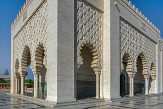 White marble exterior of Mausoleum of Mohammed V with tombs of his sons King Hassan II and Prince Abdallah in city Rabat