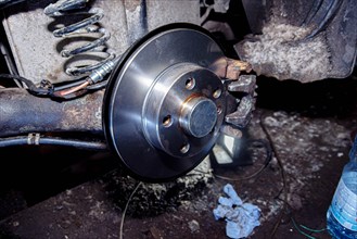 Installing a new brake disc on a car hub