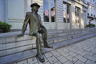 Statue of actor comedian Romain De Coninck in front of the Minard Theatre at Ghent