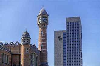 Gent-Sint-Pieters railway station clock tower and Virginie Loveling building