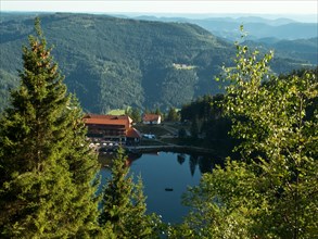 View of Mummelsee with mountain hotel