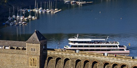 Elevated view of the Eder dam with the dam wall and the excursion boat Edersee Star on the Edersee