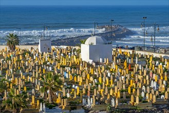 Islamic graves with headstones at the Laalou muslim cemetery with view on the Atlantic Ocean in the city Rabat
