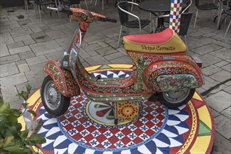 Colourfully painted Vespa from India