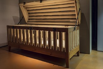 19th century padded cage bed for epileptics in the Dr Guislain Museum about the history of psychiatry in the former Guislain Hospice