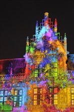 Monumental light projections on facade of Post Plaza by the French artist group Spectaculaires during the 2011 light festival of Ghent