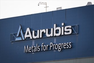 Logo and lettering Aurubis Metal for Progress on a factory building at the Aurubis AG plant