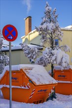 Waste container with fresh snow