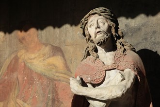 Statue of Christ on the facade of the Piarist Church or Frauenbergkirche in Krems