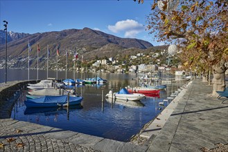 Lungolago of Lake Maggiore with motorboats