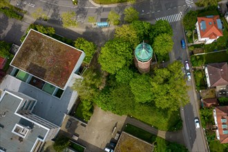 Top view of a water trough surrounded by trees near a road junction, Pforzheim, Germany, Europe