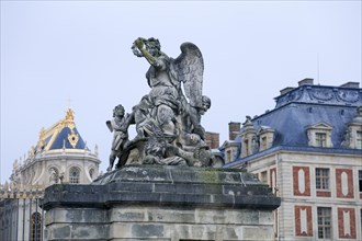 Statue of La Victorie sur l'Empire Palace next to the entrance to the cour d'honneur, chapel at the