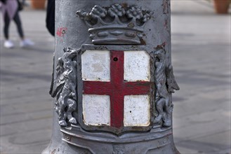 Coat of arms of Genoa on a lantern in Piazza de Ferrari, Genoa, Italy, Europe