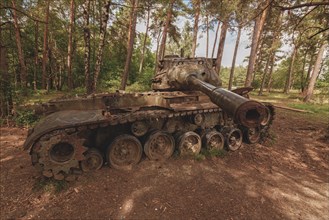 Old tank in the forest with sunbeams shining through the trees, M47 Patton, Lost Place, Brander