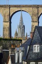 View from the Place Alende, on the viaduct of the railway line Paris-Brest and church tower of the