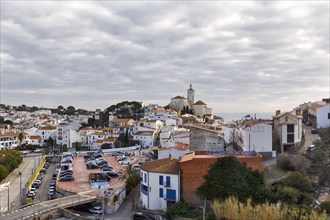 Local view, former fishing village of Cadaques with landmark, white church of Santa Maria,