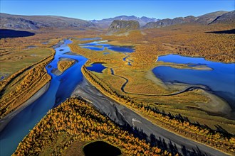 Aerial view of river delta with mountains in autumn, Rapadalen and Nammatj, Laponia, Lapland,