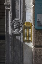 Relief of a bust of a Caesar on the entrance portal of a former palazzo, historic centre, Genoa,