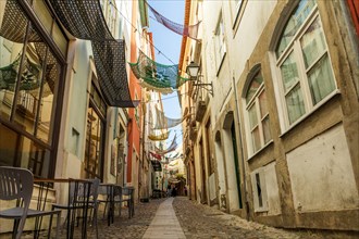 Narrow streets in old town of historic Coimbra, Portugal, Europe