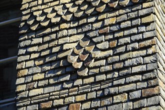 Detail of the shingle-clad facade of an old house in Rue Ange de Guernisac, Morlaix Montroulez,