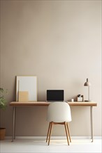 A clean and elegant home office setup featuring a wooden desk with a laptop, framed art, and modern