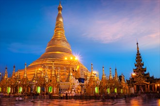 Myanmar famous sacred place and tourist attraction landmark, Shwedagon Paya pagoda illuminated in