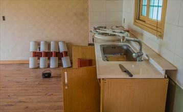 Daejeon, South Korea, June 29, 2018: Kitchen counter top of abandoned house with electrical