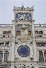St. Mark Clock Tower (Torre dell Orologio) with Astronomical clock and winged lion statue in San