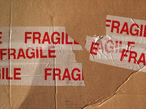 Fragile on cardboard packet