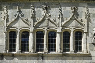Window of the ossuary from the 16th century, Enclos Paroissial de Pleyben, Finistere department,